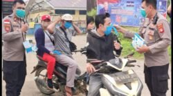 DUKUNG OPS AMAN NUSA II & TANGGAP DARURAT ASAP KARHUTLA, POLSEK MELIAU BAGIKAN 150 MASKER KE MASYARAKAT